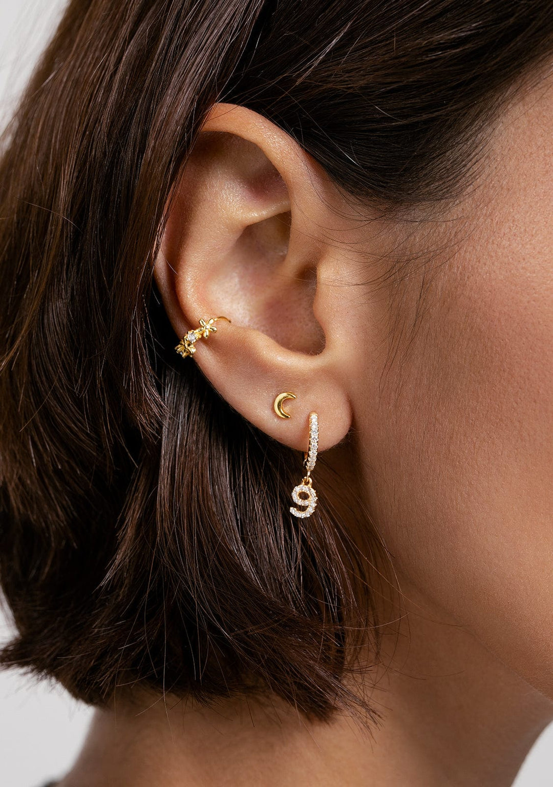 Nine Piercing Gold